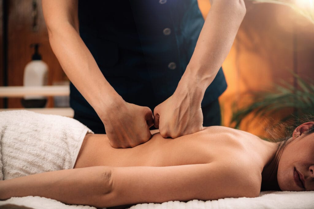 Image of Tulsa Deep Tissue Massage Therapy as a therapist massages a patient's back