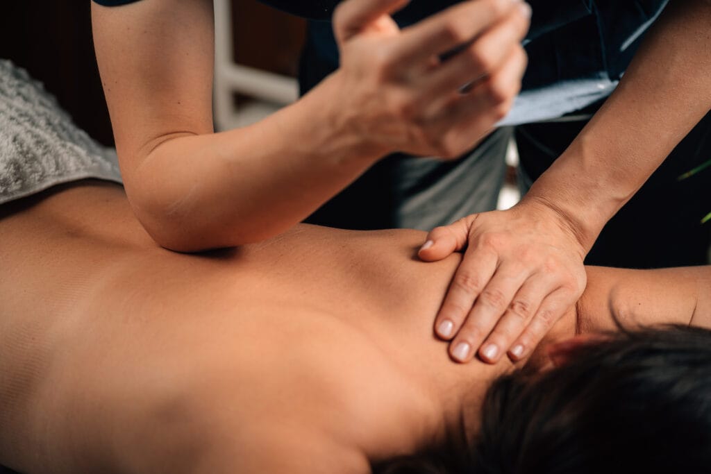 Image of Tulsa Deep Tissue Massage as a therapist uses their elbow for therapeutic pressure on a patient's back