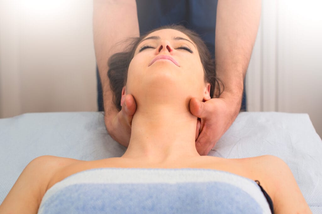 Tulsa Swedish Massage | Medical Massage of Tulsa Swedish Massage Therapist massaging the neck of woman In our Tulsa location.