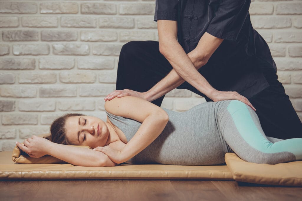 Tulsa Prenatal Massage | Medical Massage of Tulsa traditional thai massage of a pregnant woman 2021 08 26 16 16 47 utc | Medical Massage of Tulsa
