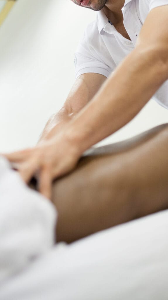 Therapist applying Tulsa sports massage